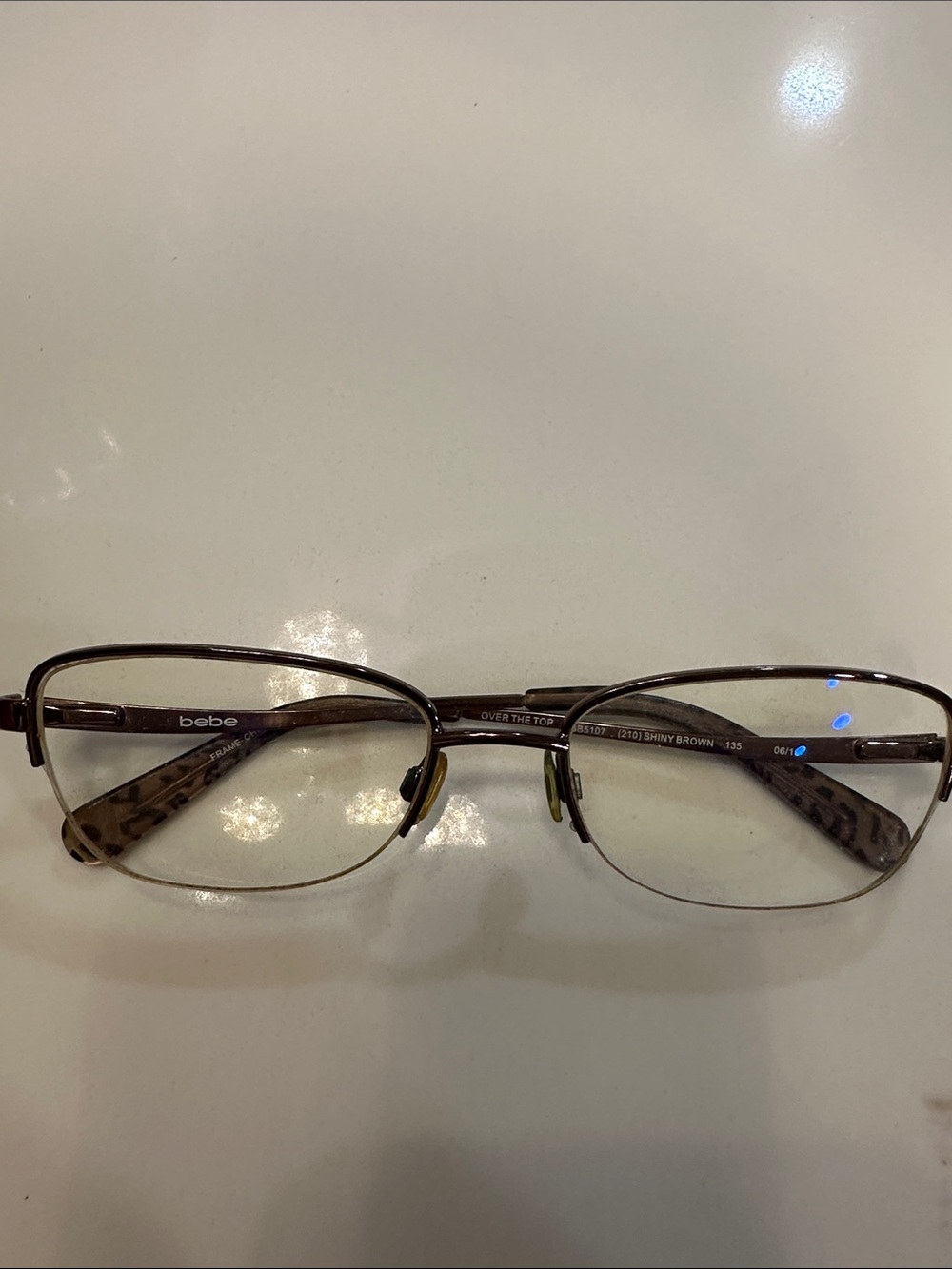 bebe Men's Shiny Brown Metal Frame Glasses with Leopard Temples